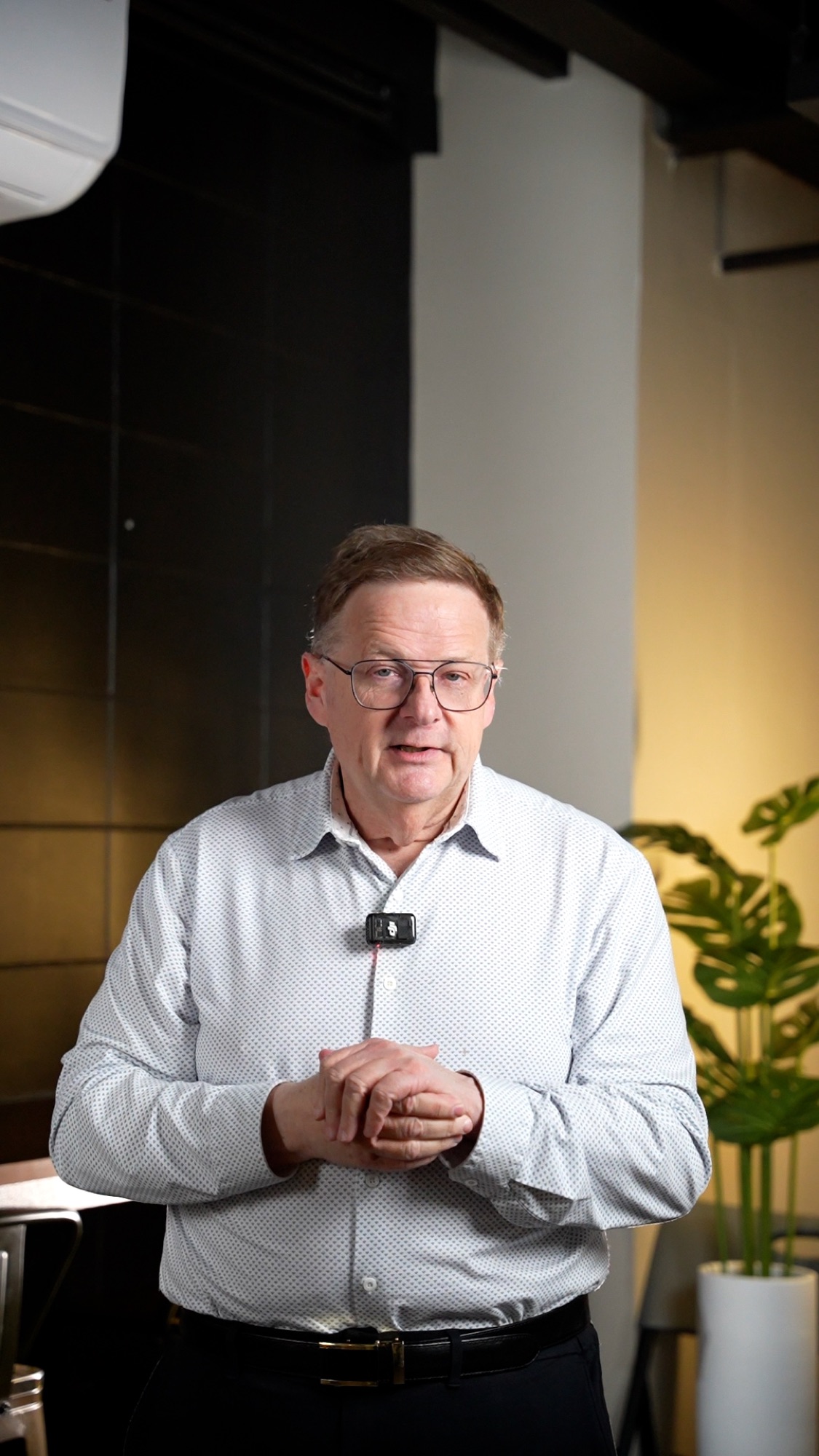 Peter Holtz speaking to camera